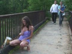 Girlie Posing On Bridge Gets Busted By Passers-By