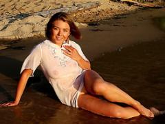 Gorgeous Teen Hottie Showing Her Tempting Slim Body While Bathing In The Sea On These