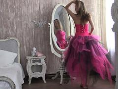 Gorgeous Teen Taking Off A Luxurious Evening Dress In Front Of A Large Mirror On Movi