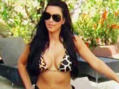 Celebrity Babe Kim Kardashian Caresses Her Huge Breasts In B...