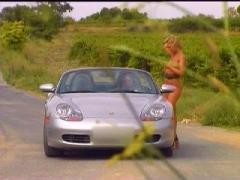 Pretty Female Nudist Hitchhiking A Car And Giving A Blowjob To A Driver