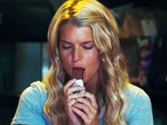 Celebrity Babe Jessica Simpson Sexy While Eating Bar Of Choc...